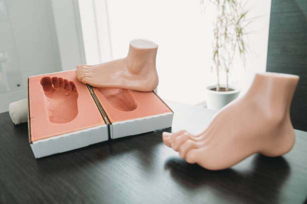 Photo d'une boîte à empreinte utilisées pour la prise de moulage et d'un éducatif de pied creux